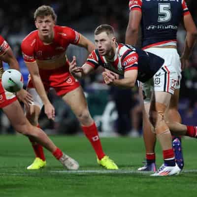 Walker magic gets Roosters win over Dolphins in classic