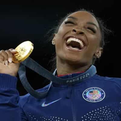 Dazzling Biles vaults to her seventh Olympic gold medal