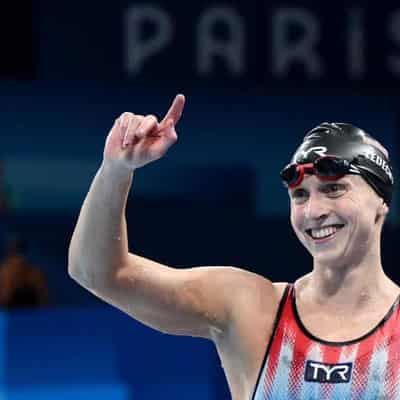 Ledecky swims into history - and she's still not done