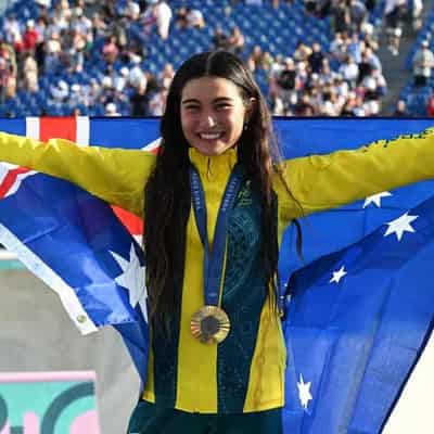 Skateboarder Trew, 14, wins historic Olympic gold medal