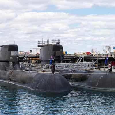 Submarine workers walk off docks over pay dispute