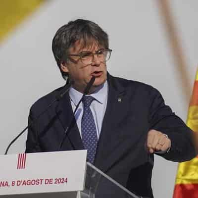 Ex-Catalan leader leaves Spain after avoiding arrest