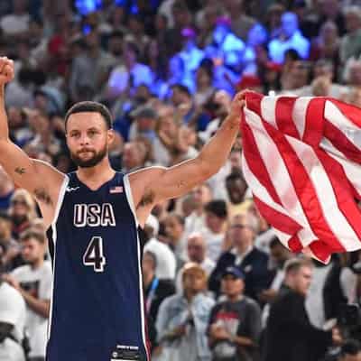 Curry's late show seals men's basketball gold for US