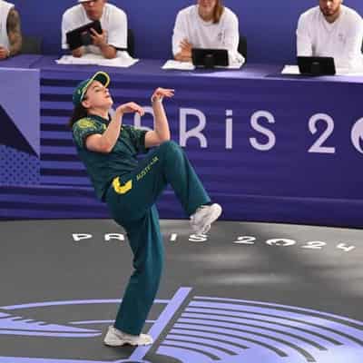 Leaders dance to aid of under-fire Olympian 'Raygun'