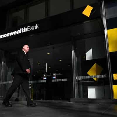 Shareholders still cash in as CBA profit slips to $9.5b