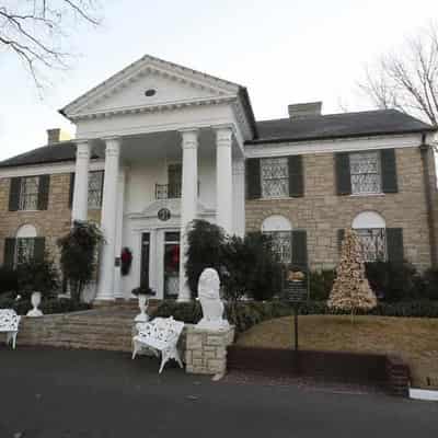 Woman charged in brazen plot to auction Graceland