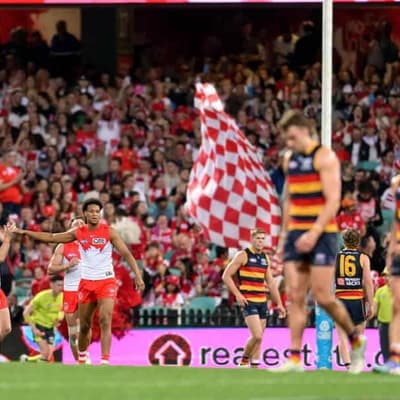 Swans rout Crows to clinch AFL minor premiership