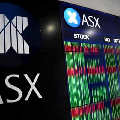 Shares recoup losses to end flat as Aussie dollar rises