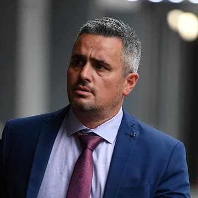 Court overturns detective's sacking over corpse photos