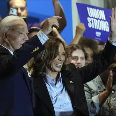 Harris pitches to union workers with Biden at her side