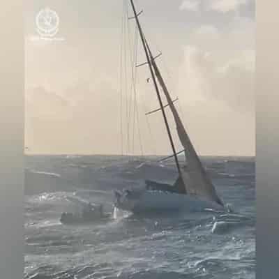 Extremely lucky yacht duo 'glad to be back' on dry land