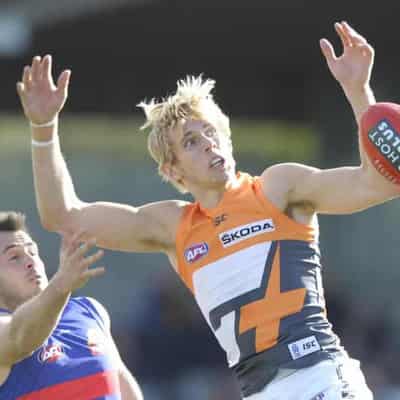 Giant goodbyes: Cumming, Haynes to leave AFL club