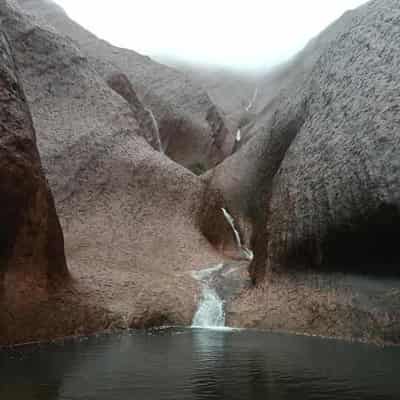 Record-breaking storms leave Uluru with waterfalls