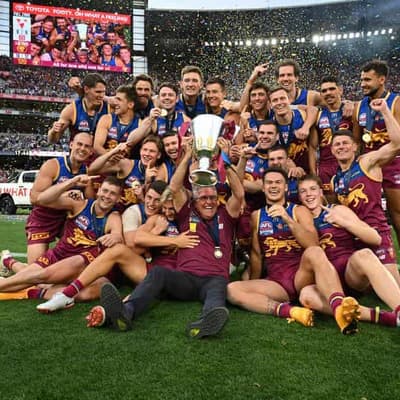 Resilient Lions claim AFL flag with huge win over Swans