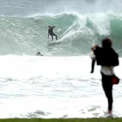 Flood risk downgraded as wild weather eases