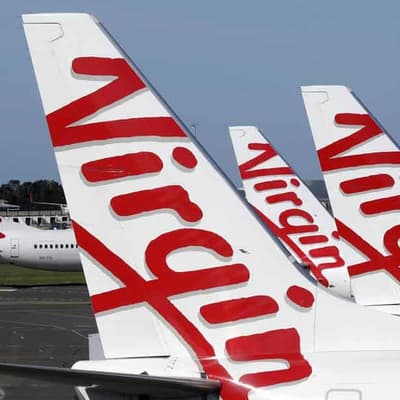 Travellers to fly for less if Qatar lands Virgin deal
