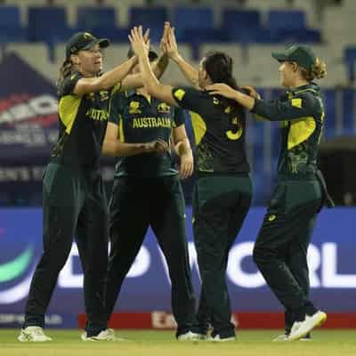 Disciplined Australia crush Kiwis to close in on semis