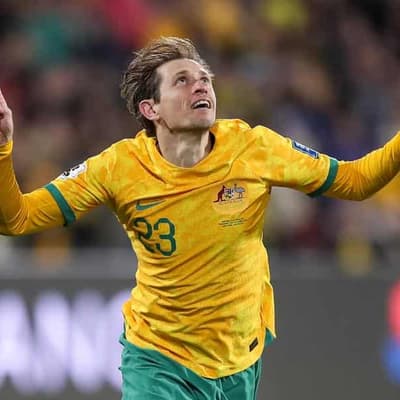 Popovic's Socceroos sink China to revive World Cup hope