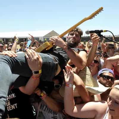 Quit stage diving at concerts, insurers tell musicians