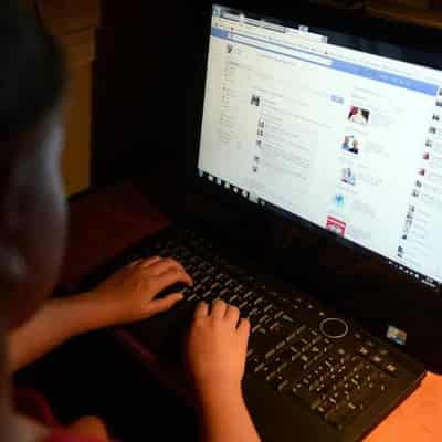 Protect children from online hellholes, spy chief urges