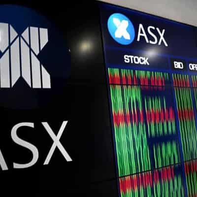 Optimism pushes Australian shares to a record finish