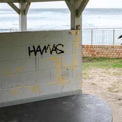 Police probe after beaches hit with 'Hamas' graffiti