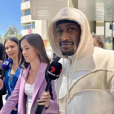 Rape-accused UK rapper blows kiss to fans outside court