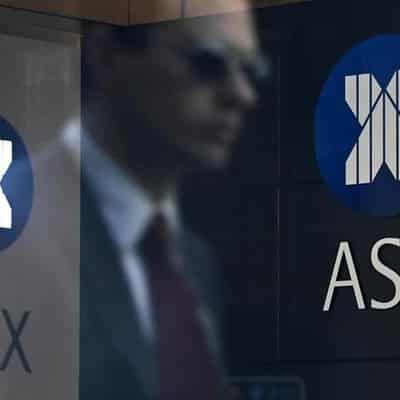 Aussie shares edge higher, snapping two-week win streak