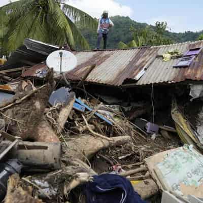 At least 115 dead or missing in flood-hit Philippines