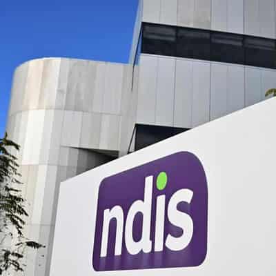 Spending on NDIS $1 billion lower than forecasts