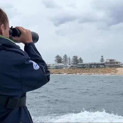 Search for boy swept out to sea set to enter third day