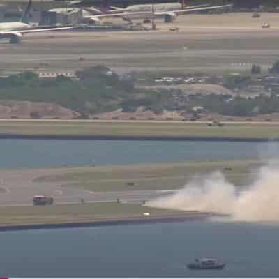 Probe into Qantas 'loud bang' engine fail, runway fire