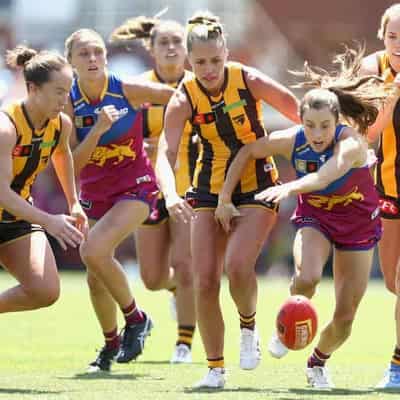 Lions fight past Hawks into AFLW prelim final