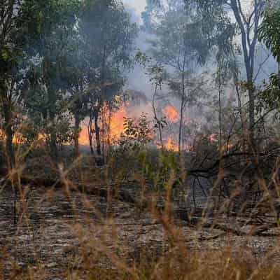 Country town in sights after fire burns home, bridge