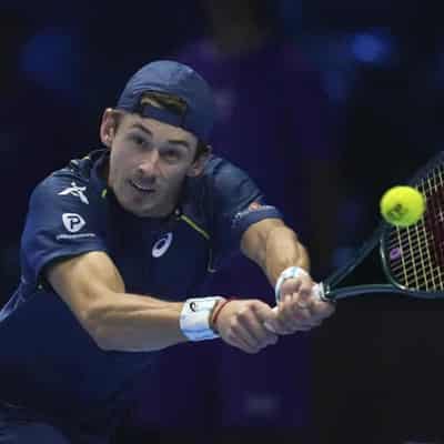 De Minaur winces with pain of injury and ATP Finals KO