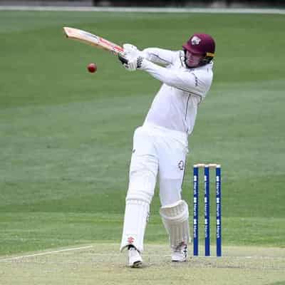 Renshaw century helps Bulls thwart Tigers' victory push