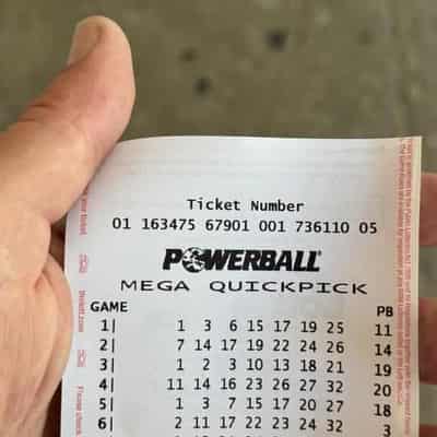 Half of nation vie for $100m Powerball jackpot prize