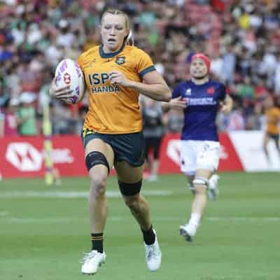 Australia's sevens teams seal Dubai quarter-final spots