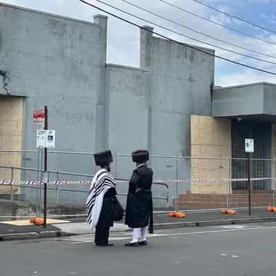 Mix of quiet sorrow and anger over synagogue attack