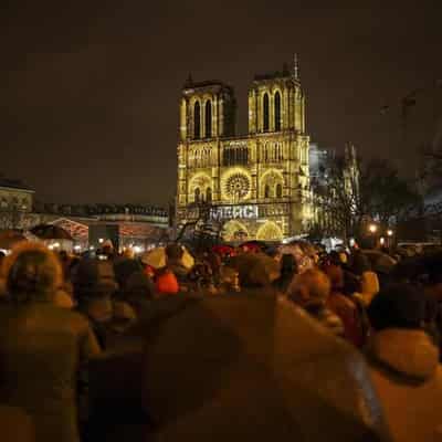 World leaders watch Notre-Dame reopen with a 'merci'