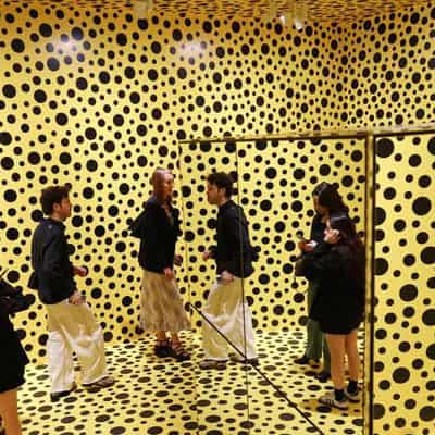 Step into an infinite polka dot universe at Kusama show