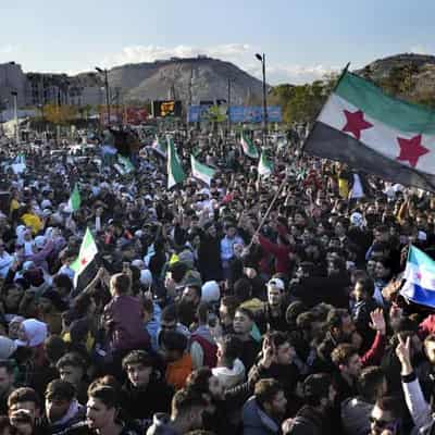 Thousands celebrate in Damascus after Friday prayers