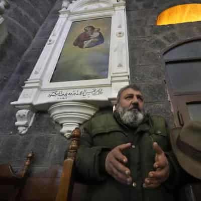 Christians attend services, schools reopen in Syria