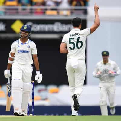 Australia run through India between rain delays