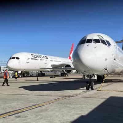 Long flight to justice ends for sacked Qantas workers