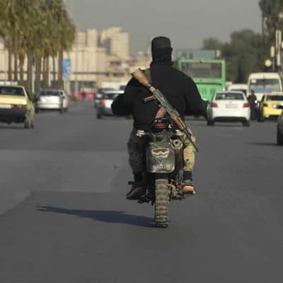 France to host Syria summit, cautious on sanctions end