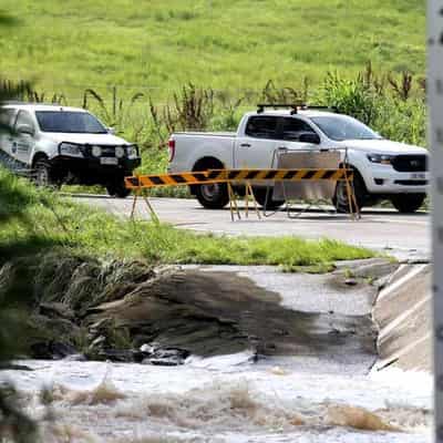 Boy survives being sucked into drain as floodwaters hit