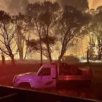 Evacuations as fires rage in nation's east