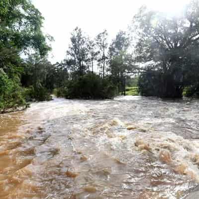 Flooding cuts off roads, more rainfall on its way