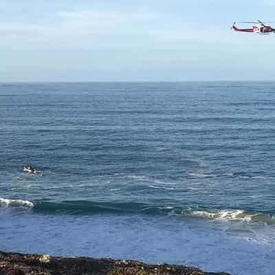 Two dead after boat capsizes near holiday town